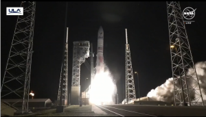 Screengrab of NASA livestream showing rocket leaving the pad. Night launch.