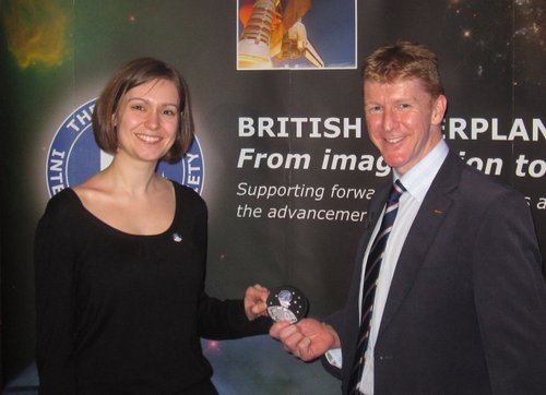 Handing over the Spacetweep Patch to Tim Peake Kate Arkless Gray and Tim Peake with the SpaceTweep Society Patch