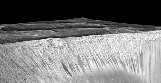 Dark, Recurring Streaks on Walls of Garni Crater. Image Credit: NASA/JPL-Caltech/Univ. of Arizona