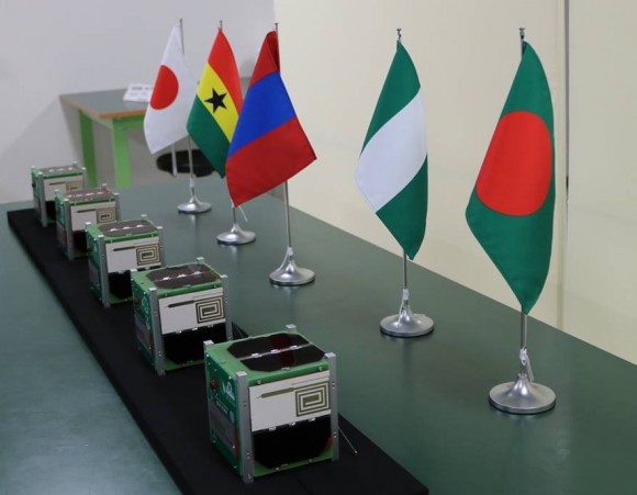 Birds-1 CubeSats by their respective nations' flags.